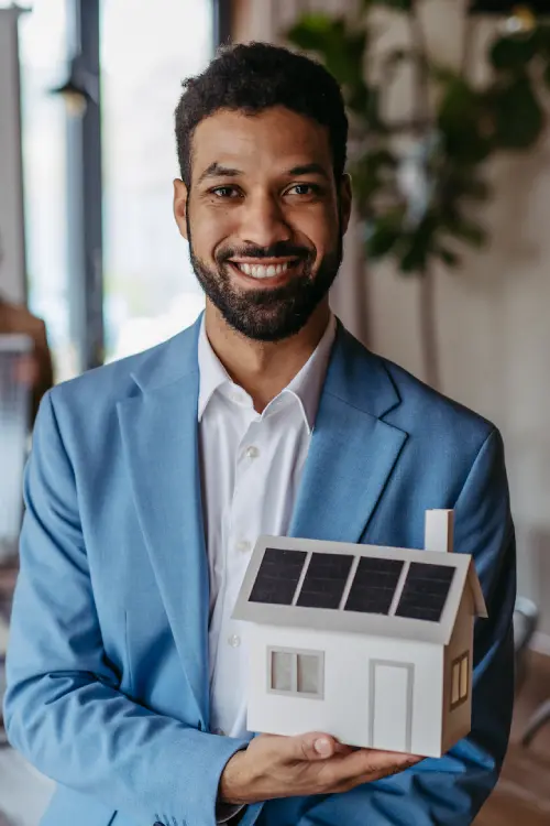 A Men Hanging short Fancy house in his hands